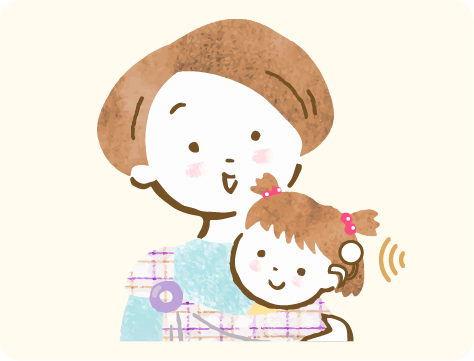 人工内耳をつけた子どもと母親